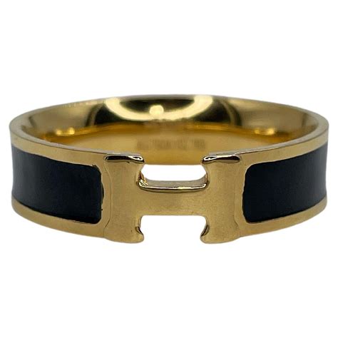 hermes black and gold|authentic Hermes rings.